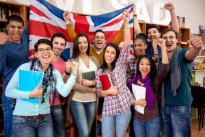 Cheerful British students celebrate victory
