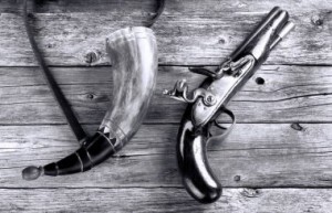 depositphotos_297149350-stock-photo-antique-flintlock-pistol-and-gunpowder